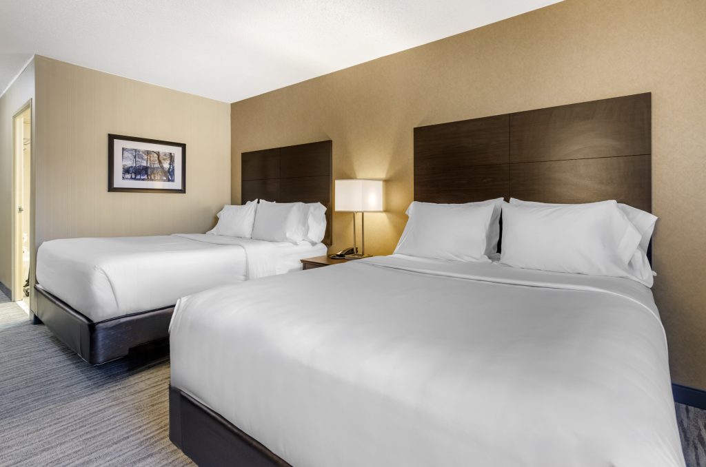 Charleston Tower Hotel guest room with two queen beds.