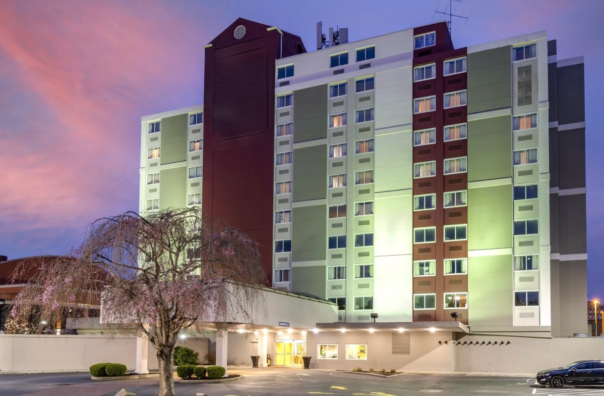 Charleston Tower Hotel exterior image at dusk